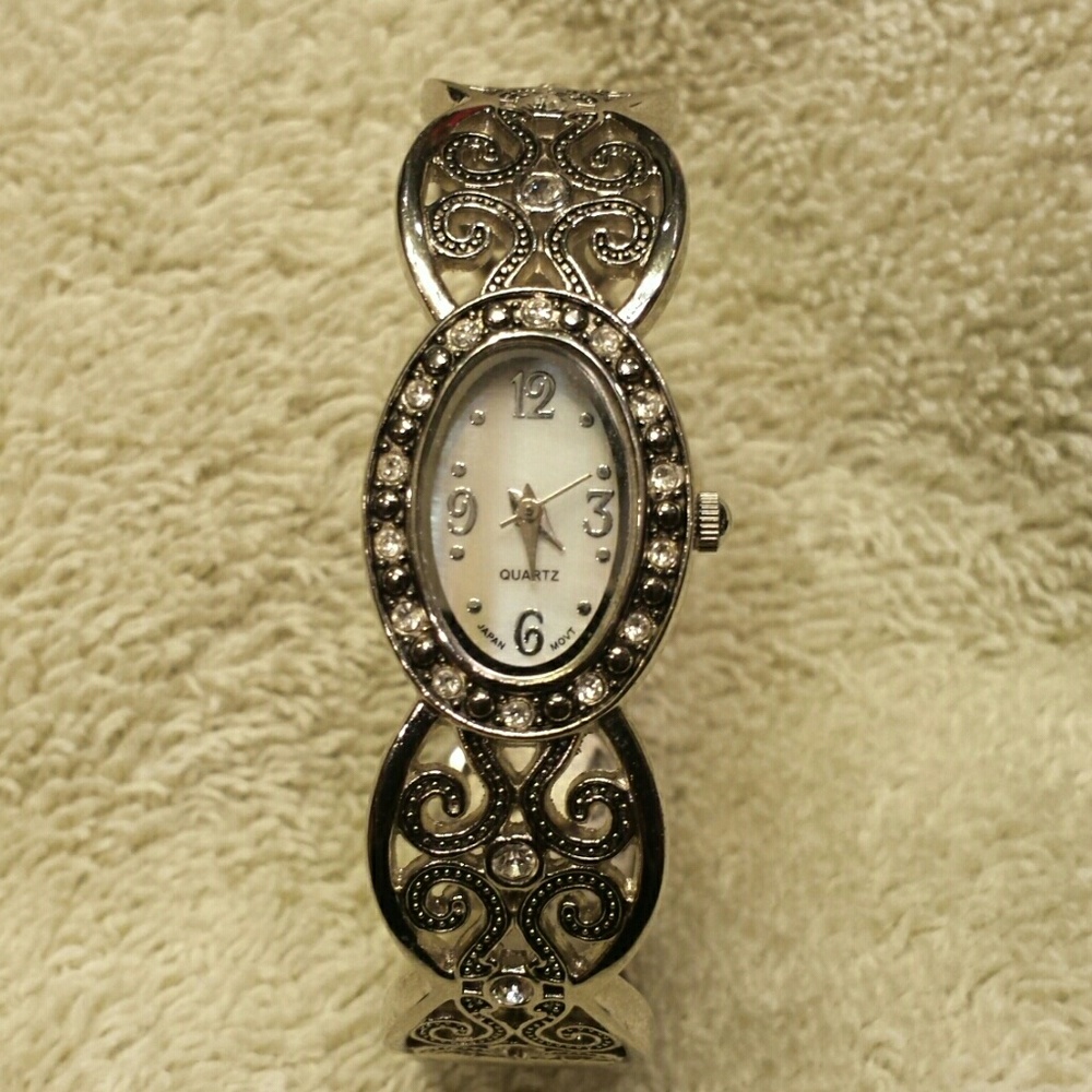 Silver filigree cuff Watch